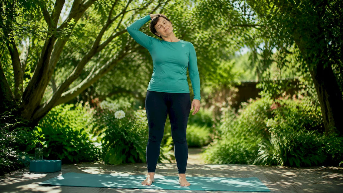 Woman doing gentle neck stretches indoors