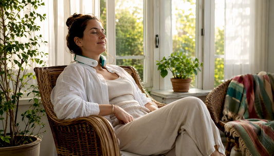 Woman using neck therapy device at home